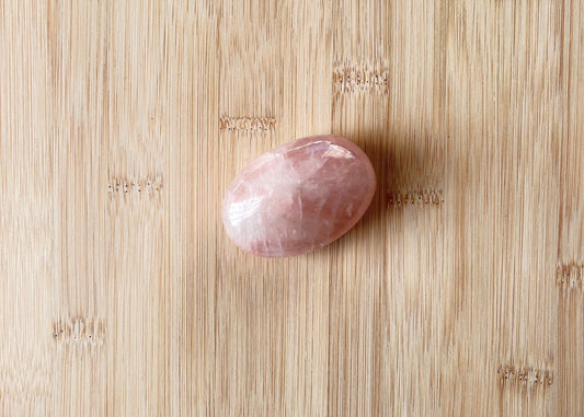 Natural Rose Quartz displaying soft blush-pink colouring with a smooth polished finish.