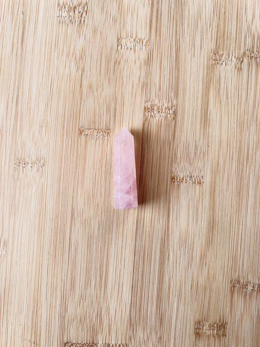 Natural Rose Quartz displaying soft blush-pink colouring with a smooth polished finish.