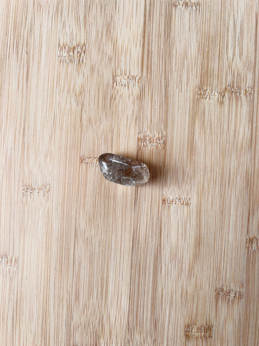 Natural Smoky Quartz displaying beautiful smoky brown transparency with polished surfaces.